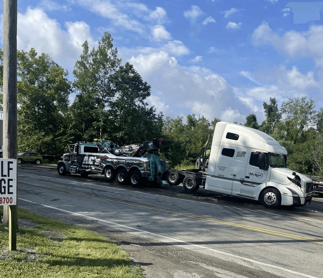 AC’s Towing heavy wrecker with an 18-wheeler