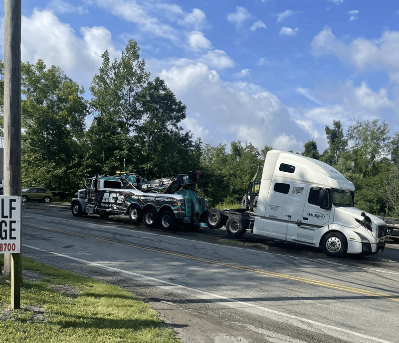 AC’s Towing heavy wrecker with an 18-wheeler