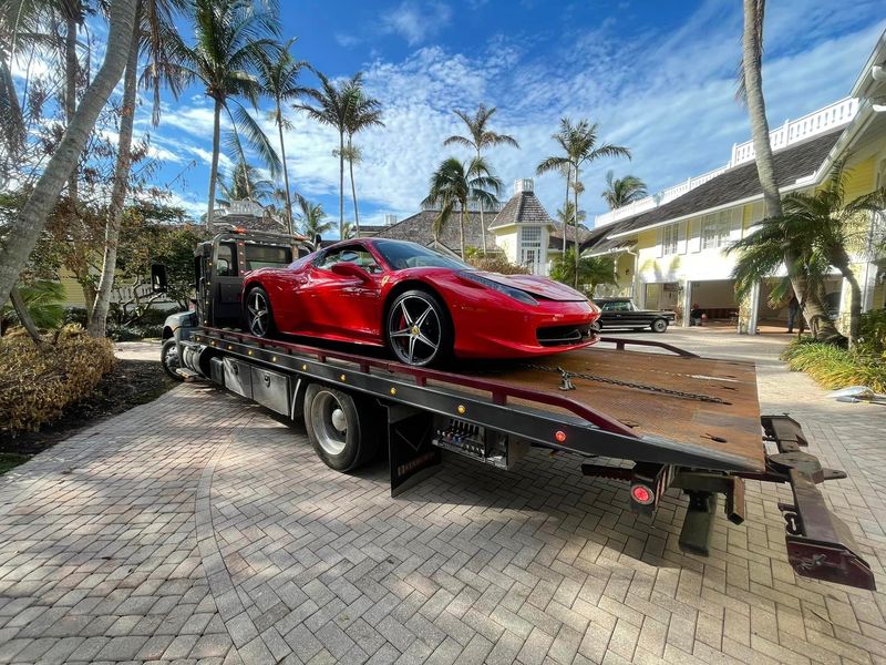 Exotic car being towed by AC’s Towing